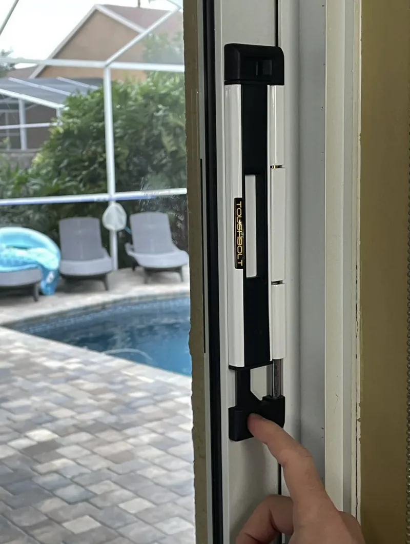 Deadbolt security lock installed on a sliding patio door