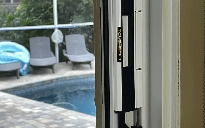 Heavy-duty deadbolt lock installed on a sliding patio door